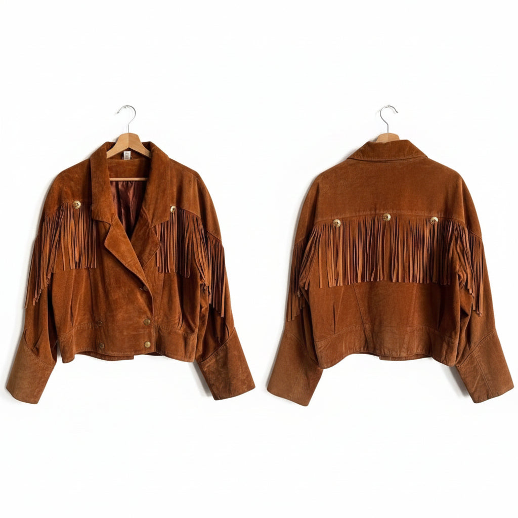 Brown suede jacket with fringes on a hanger against a white background