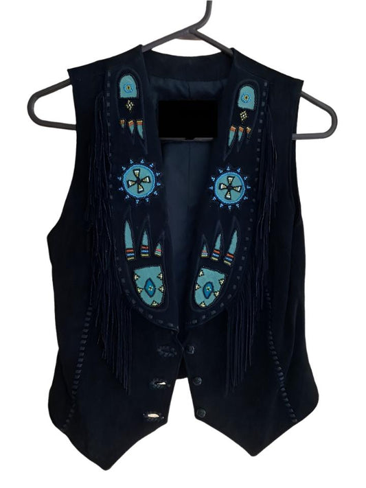 A black suede leather fringe vest with Paw beaded detailing and a button front closure, displayed on a hanger.