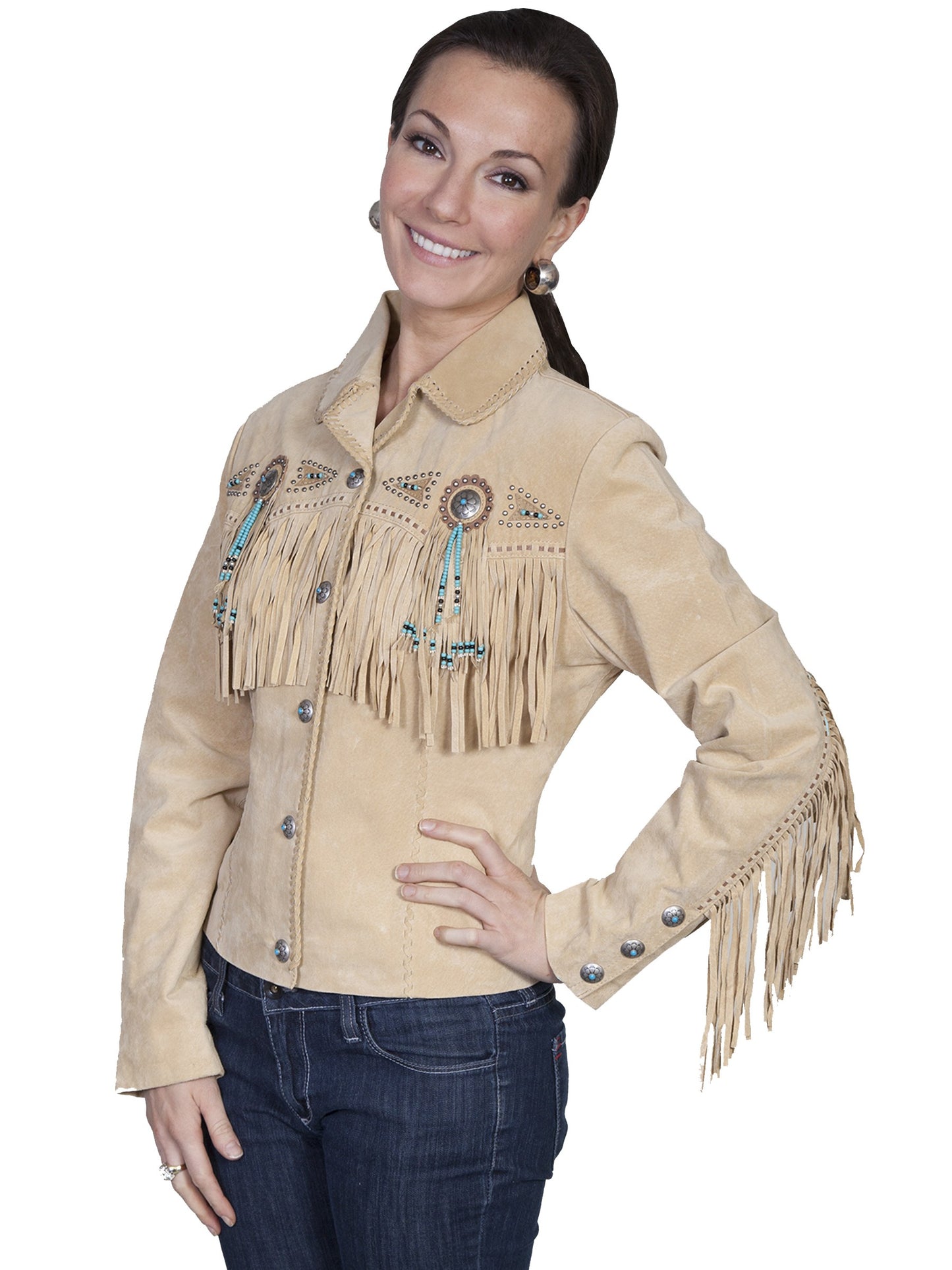 Woman wearing a beige fringed jacket with decorative elements on a white background