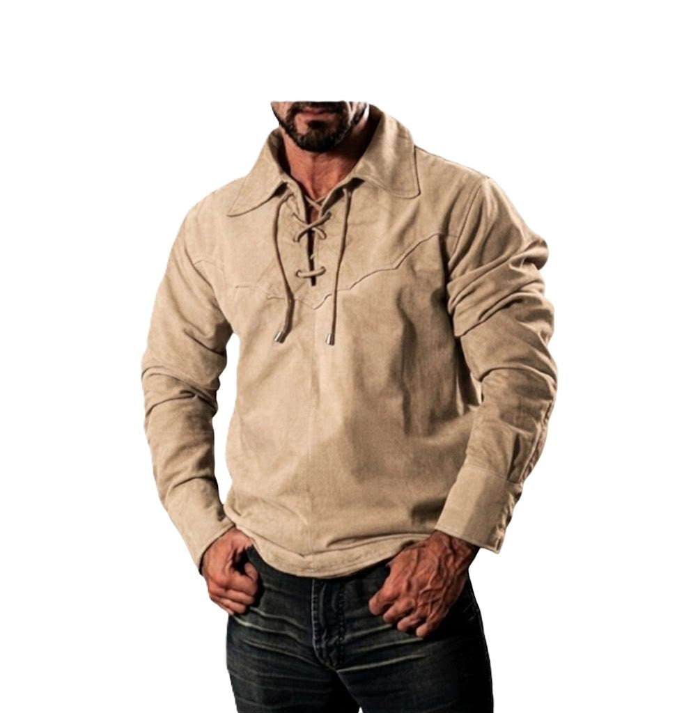 Man wearing a beige long-sleeve shirt with a high collar on a white background