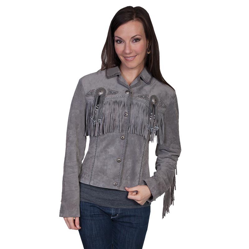 Woman wearing a gray fringed jacket on a white background